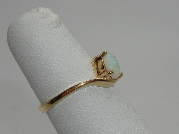 Radiant 10K Gold Fiery Opal Ring (Size 3.5) - Approx. 1/4 Carat