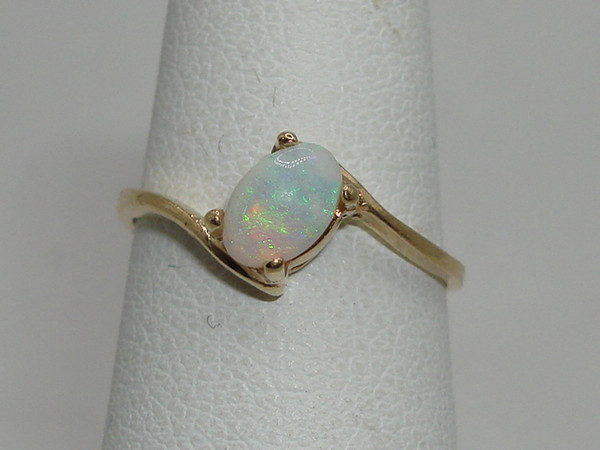Radiant 10K Gold Fiery Opal Ring (Size 3.5) - Approx. 1/4 Carat