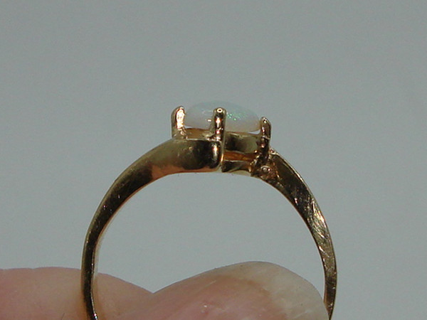 Radiant 10K Gold Fiery Opal Ring (Size 3.5) - Approx. 1/4 Carat
