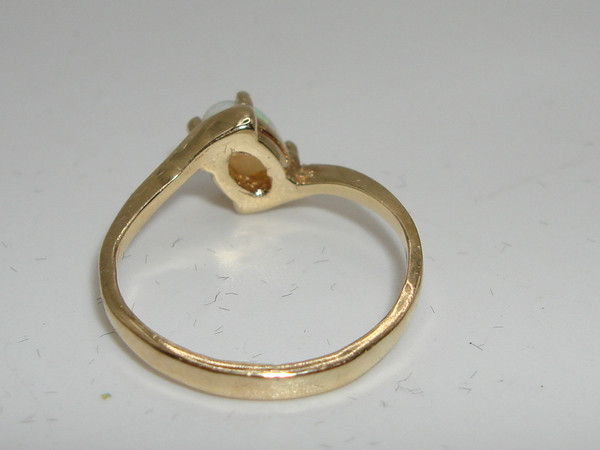 Radiant 10K Gold Fiery Opal Ring (Size 3.5) - Approx. 1/4 Carat