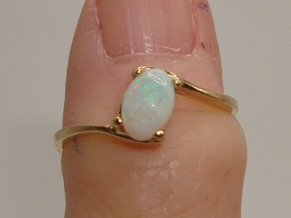 Radiant 10K Gold Fiery Opal Ring (Size 3.5) - Approx. 1/4 Carat
