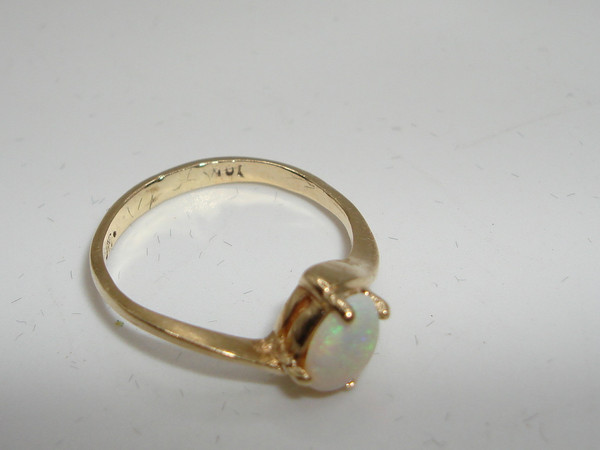 Radiant 10K Gold Fiery Opal Ring (Size 3.5) - Approx. 1/4 Carat