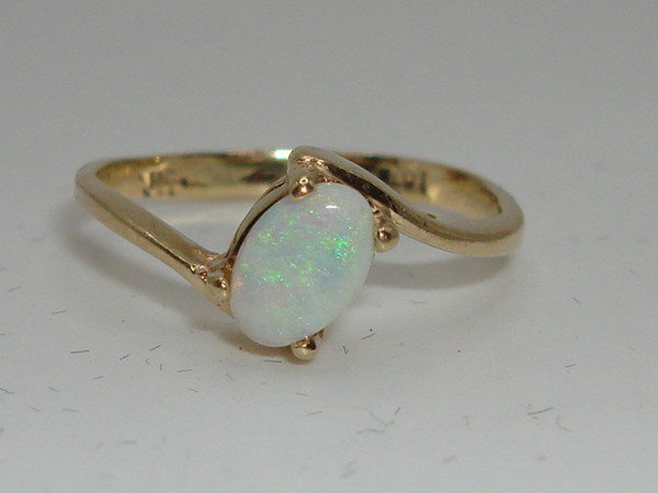 Radiant 10K Gold Fiery Opal Ring (Size 3.5) - Approx. 1/4 Carat