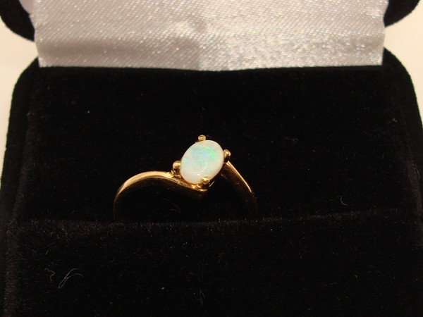 Radiant 10K Gold Fiery Opal Ring (Size 3.5) - Approx. 1/4 Carat