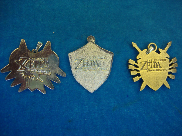 3 Unique Zelda Pendants - Iconic Video Game Collectibles (Excellent Condition)