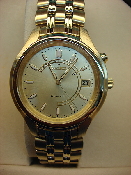 SEIKO SKH046 Men's Kinetic Wristwatch (NIB) - Visible Movement, Gold-Tone Finish - Verizon Award