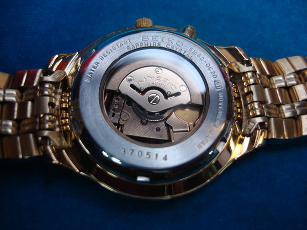 SEIKO SKH046 Men's Kinetic Wristwatch (NIB) - Visible Movement, Gold-Tone Finish - Verizon Award
