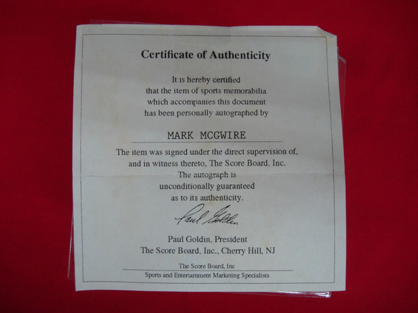 Mark McGwire Autographed Baseball w/ COA by Scoreboard Inc.