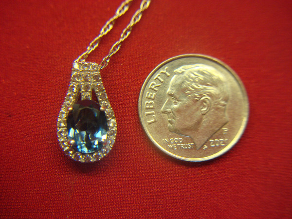 Sterling Silver Oval Topaz Pendant w/ White Topaz Accents & 18