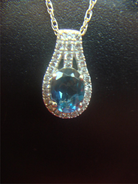 Sterling Silver Oval Topaz Pendant w/ White Topaz Accents & 18