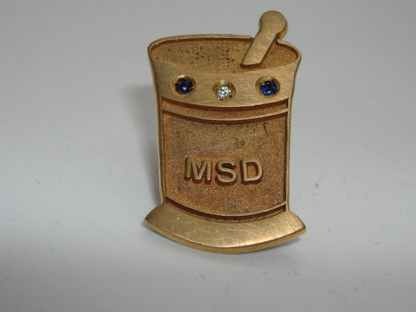 Vintage Merck, Sharp & Dohme (MSD) Mortar & Pestle Tie Tac - Blue Topaz Award
