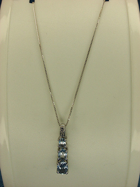 Sterling Silver Blue Topaz Pendant Necklace - Graduated Gemstones