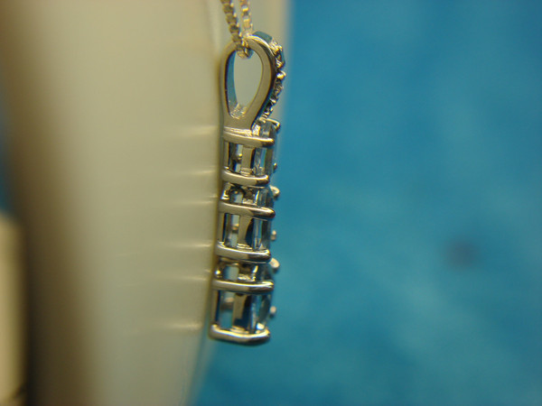 Sterling Silver Blue Topaz Pendant Necklace - Graduated Gemstones