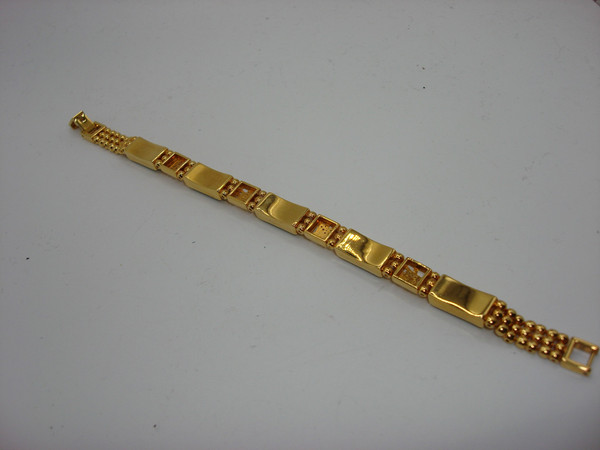 Elegant Gold-Tone Chinese Jadeite Bracelet - 7.5 Inches, Intricate Symbol Design