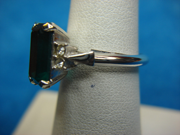 Avon Silver Tone Ring with Green Emerald Cut Stone - Adjustable Size 6.5-9
