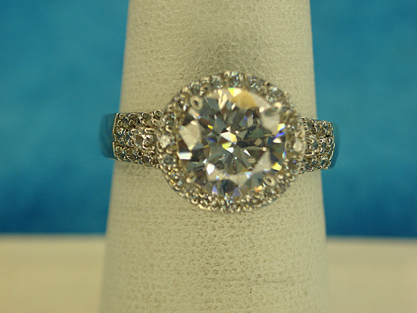 Sterling Silver Ring with Large Round Simulated Diamond & Side Stones - Size 7