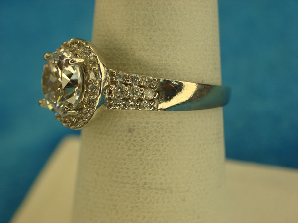 Sterling Silver Ring with Large Round Simulated Diamond & Side Stones - Size 7