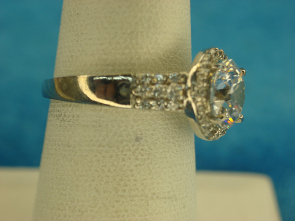 Sterling Silver Ring with Large Round Simulated Diamond & Side Stones - Size 7