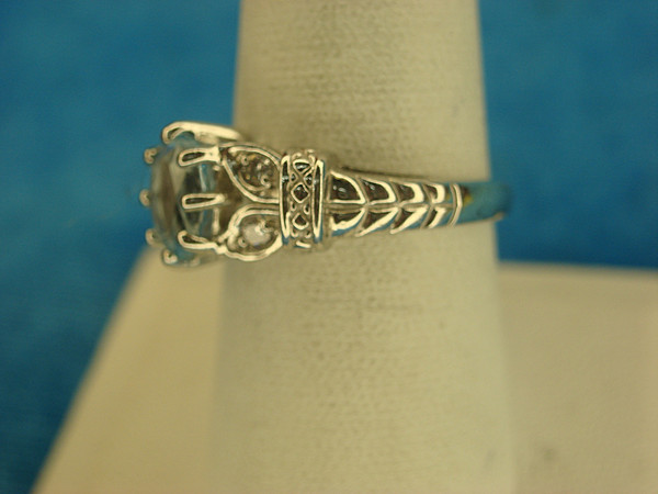 Sterling Silver Ring with Pale Blue Gemstone & Sim Diamond Accent - Size 8