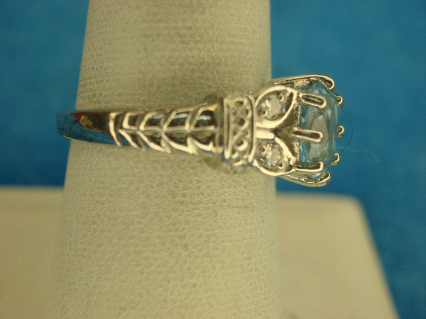 Sterling Silver Ring with Pale Blue Gemstone & Sim Diamond Accent - Size 8
