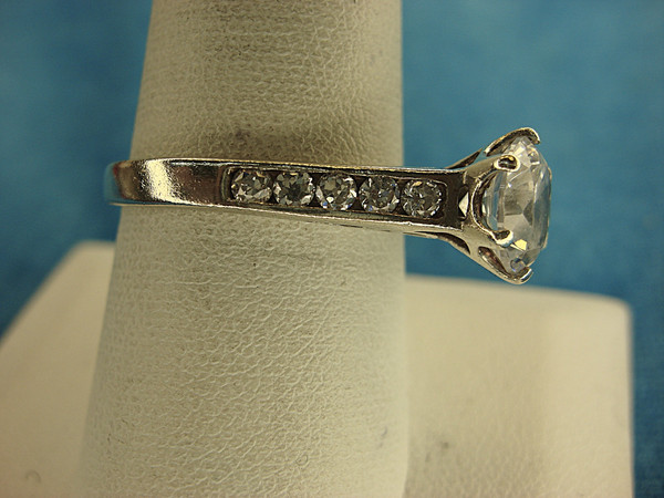 Sterling Silver Filigree Ring with 1 Large Round Sim Diamond & Smaller Accent Stones (Size 9)