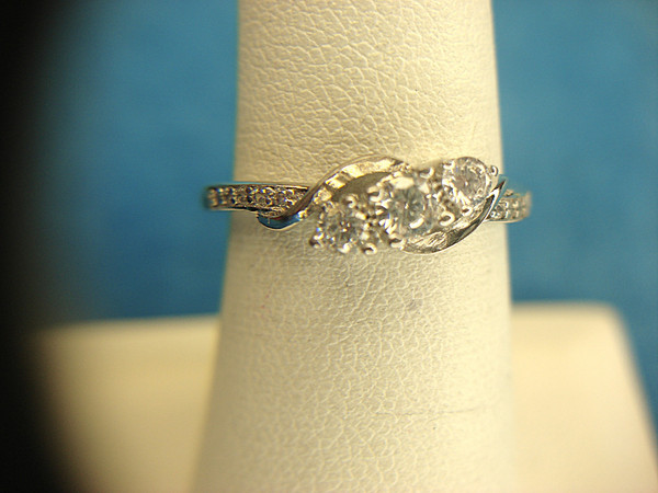 Sterling Silver Ring with Fancy Setting & Sparkling Simulated Diamonds (Size 7)