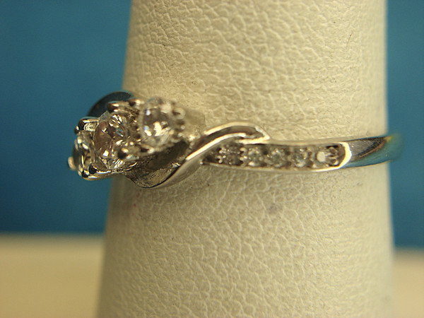 Sterling Silver Ring with Fancy Setting & Sparkling Simulated Diamonds (Size 7)