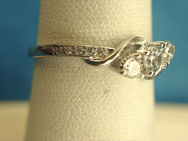 Sterling Silver Ring with Fancy Setting & Sparkling Simulated Diamonds (Size 7)