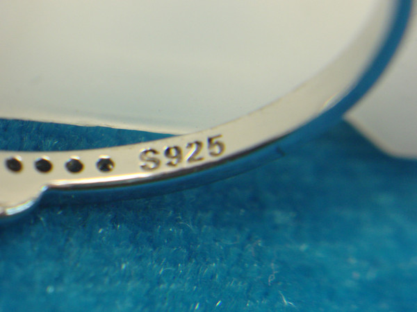 Sterling Silver Ring with Fancy Setting & Sparkling Simulated Diamonds (Size 7)