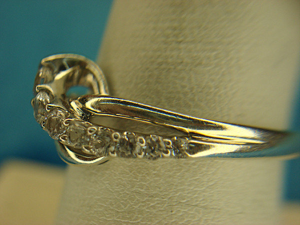 Sterling Silver Ring with Sparkling Round Simulated Diamonds - Size 8