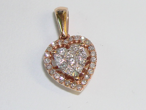 1/4 CTW Diamond Heart Pendant in 10K Rose Gold | Sparkling Petite Charm