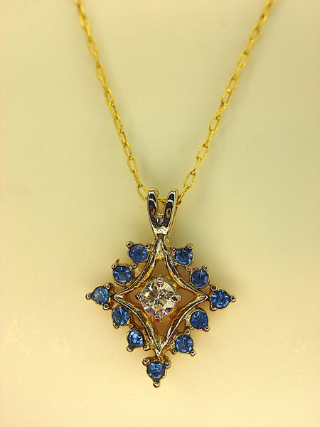 Elegant Gold-Tone Necklace with Blue Stone & CZ Pendant (18 Inch Chain)