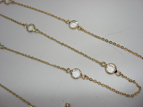Vintage 18 Inch Gold Tone Sideways Cross Necklace with Sparkling Clear Glass Stones