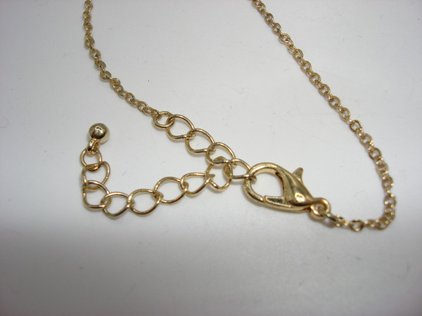 Vintage 18 Inch Gold Tone Sideways Cross Necklace with Sparkling Clear Glass Stones